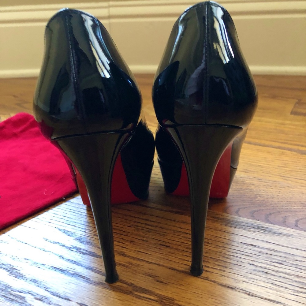 Christian Louboutin patent leather Bianca pumps.
